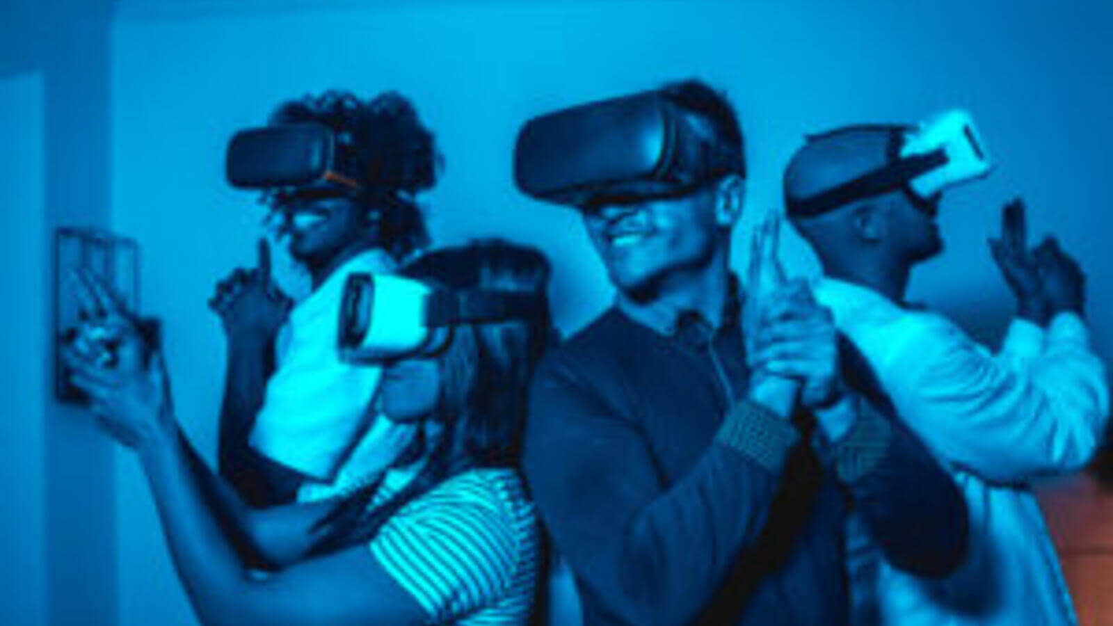 Men and women with VR headsets on