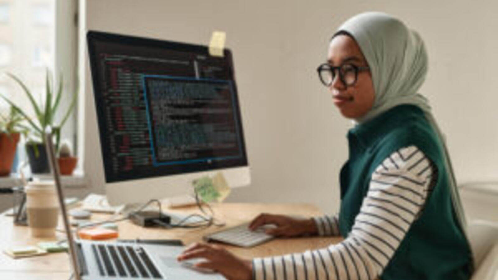 Woman on computer stock image