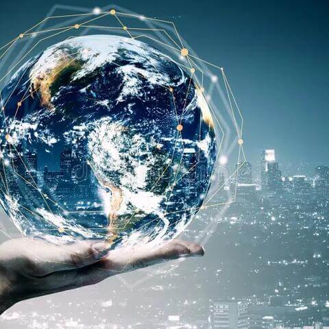 Hand holding globe
